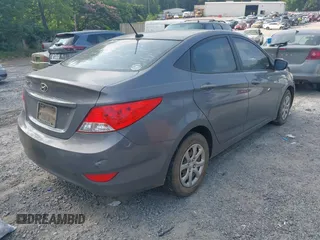 2013 Hyundai Accent GLS z VIN KMHCT4AEXDU502319, wystawiony jako IAAI lot #42423517 z przebiegiem 228 402 mil mil oraz . Historia ofert i sprzedaży dostępna na DreamBid. Obrazek 4.