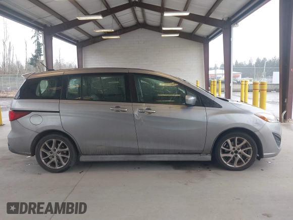 2012 Mazda Mazda5 Grand Touring with VIN JM1CW2DL7C0143303, listed as a IAAI auction lot 41924227 with 126,689 mi miles. Bid and sale history available at carsss.com. Image 13.