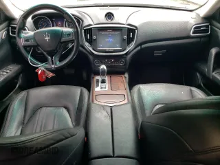 2014 Maserati Ghibli S Q4 z VIN ZAM57RTA8E1083877, wystawiony jako Copart lot #57812725 z przebiegiem 94 088 mil mil oraz Czysty tytuł • Clean title. Historia ofert i sprzedaży dostępna na DreamBid. Obrazek 8.