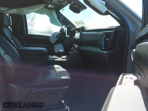 2024 GMC Sierra 1500 AT4 with VIN 1GTUUEE81RZ291215, listed as a IAAI auction lot 42029622 with 25,131 mi miles and . Bid and sale history available at DreamBid. Image 5.