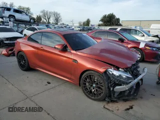 2020 BMW M2 Competition with VIN WBS2U7C06L7G01793, listed as a Copart auction lot 48419355 with 74,459 mi miles and Salvage Title. Bid and sale history available at carsss.com. Image 4.