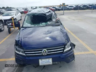 2021 Volkswagen Tiguan S with VIN 3VV1B7AX4MM150765, listed as a IAAI auction lot 42505134 with 19,590 mi miles and . Bid and sale history available at DreamBid. Image 6.