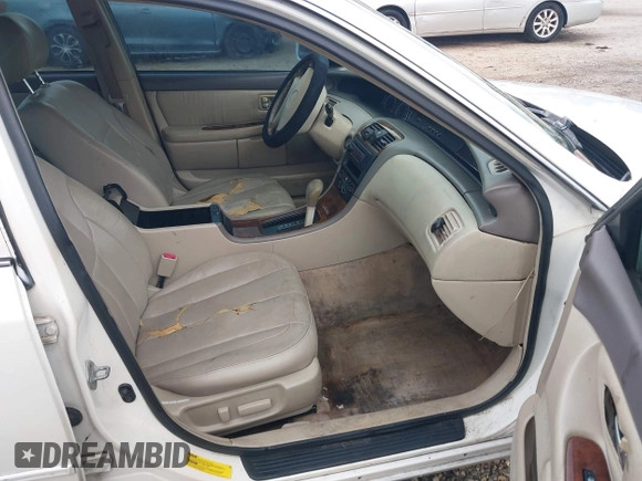 2001 Toyota Avalon XL z VIN 4T1BF28B01U114773, wystawiony jako IAAI lot #42506167 z przebiegiem 155 540 mil mil oraz . Historia ofert i sprzedaży dostępna na DreamBid. Obrazek 5.