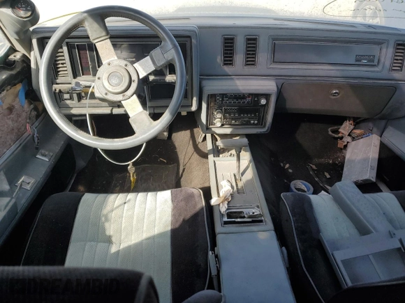 1986 Buick Regal with VIN 1G4GK4774GP228180, listed as a Copart auction lot 76890864 with Not Provided miles and Salvage Title. Bid and sale history available at DreamBid. Image 8.