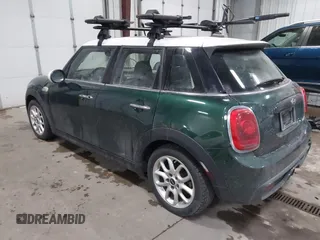 2015 MINI Hardtop 4 Door S z VIN WMWXU3C55FT892293, wystawiony jako IAAI lot #41359066 z przebiegiem 112 704 mil mil oraz . Historia ofert i sprzedaży dostępna na DreamBid. Obrazek 3.