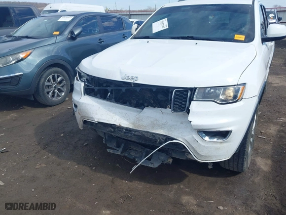 2021 Jeep Grand Cherokee Laredo X with VIN 1C4RJEAG2MC605574, listed as a IAAI auction lot 41642362 with 104,066 mi miles. Bid and sale history available at carsss.com. Image 6.
