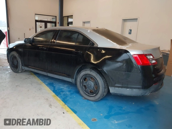 2013 Ford Police Interceptor with VIN 1FAHP2M87DG124585, listed as a IAAI auction lot 41863360 with 189,705 mi miles and . Bid and sale history available at DreamBid. Image 3.