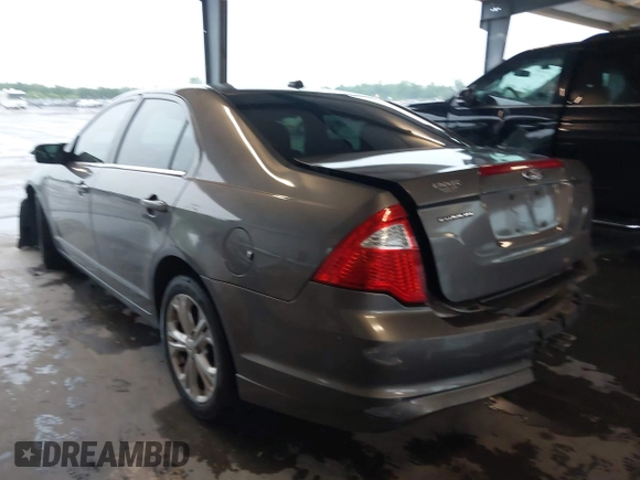 2012 Ford Fusion SE with VIN 3FAHP0HA8CR407618, listed as a IAAI auction lot 42199709 with 124,924 mi miles and . Bid and sale history available at DreamBid. Image 3.