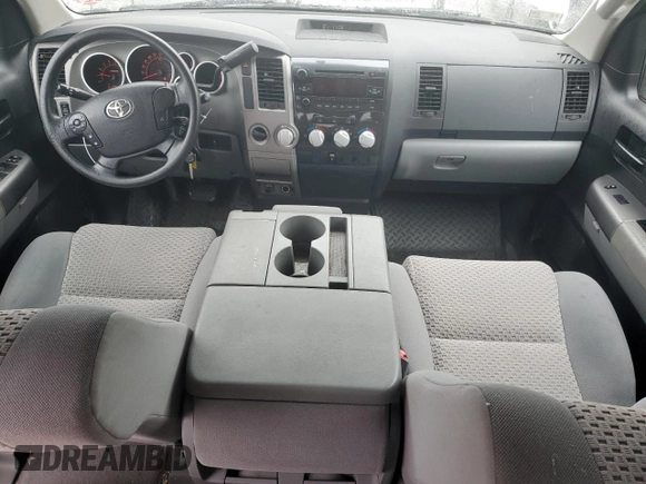 2010 Toyota Tundra with VIN 5TFUY5F15AX123633, listed as a Copart auction lot 57053995 with 85,716 mi miles and Salvage title. Bid and sale history available at DreamBid. Image 8.