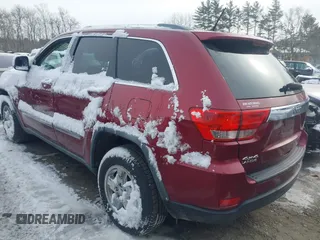 2012 Jeep Grand Cherokee Laredo with VIN 1C4RJFAGXCC174678, listed as a IAAI auction lot 41347849 with 134,156 mi miles. Bid and sale history available at carsss.com. Image 3.