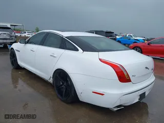 2012 Jaguar XJ with VIN SAJWA1CB7CLV35339, listed as a IAAI auction lot 41945850 with 123,501 mi miles. Bid and sale history available at carsss.com. Image 3.