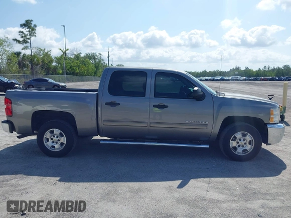 2013 Chevrolet Silverado 1500 LT with VIN 3GCPCSE01DG206827, listed as a IAAI auction lot 41976945 with 213,940 mi miles and . Bid and sale history available at DreamBid. Image 14.