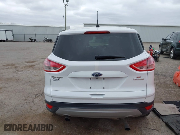 2016 Ford Escape SE with VIN 1FMCU0GX4GUB14442, listed as a IAAI auction lot 41826908 with Not Provided miles and . Bid and sale history available at carsss.com. Image 15.