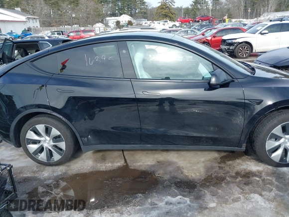 2023 Tesla Model Y Long Range z VIN 7SAYGDEE8PF826989, wystawiony jako IAAI lot #41615166 z przebiegiem 10 368 mil mil oraz . Historia ofert i sprzedaży dostępna na DreamBid. Obrazek 14.
