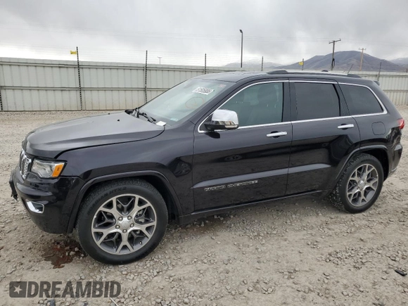 2020 Jeep Grand Cherokee Overland with VIN 1C4RJFCG9LC264711, listed as a Copart auction lot 51505885 with 52,670 mi miles and Salvage Title. Bid and sale history available at DreamBid. Image 1.