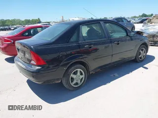 2003 Ford Focus SE with VIN 1FAFP34P83W150783, listed as a IAAI auction lot 42319653 with Not provided miles and . Bid and sale history available at DreamBid. Image 4.