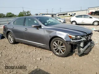 2015 Lexus LS 460 with VIN JTHCL5EF4F5025573, listed as a Copart auction lot 57178115 with 56,710 mi miles and Salvage title. Bid and sale history available at DreamBid. Image 4.