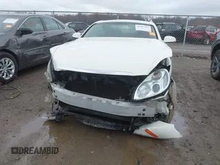 2004 Lexus SC with VIN JTHFN48Y040053735, listed as a IAAI auction lot 41982723 with 48,662 mi miles. Bid and sale history available at carsss.com. Image 6.