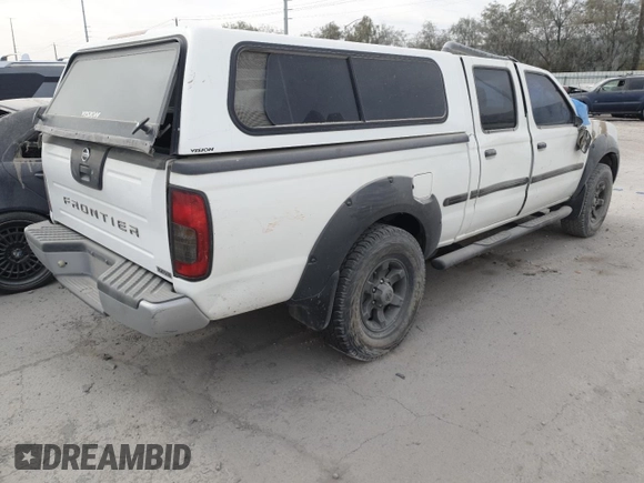 2002 Nissan Frontier XE z VIN 1N6ED29X12C348006, wystawiony jako Copart lot #41897905 z przebiegiem 91 363 mil mil oraz Szkoda całkowita • Salvage title. Historia ofert i sprzedaży dostępna na DreamBid. Obrazek 3.