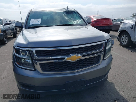 2018 Chevrolet Tahoe LS with VIN 1GNSCAEC2JR306131, listed as a IAAI auction lot 42338873 with 107,652 mi miles and . Bid and sale history available at DreamBid. Image 12.