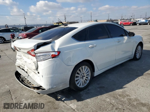 2016 Ford Fusion SE Hybrid с VIN 3FA6P0LU2GR360066, выставлен на аукционе Copart как лот 84767824 с пробегом 153 044 миль миль и Списание • Salvage title. История ставок и продаж доступна на DreamBid. Изображение 3.
