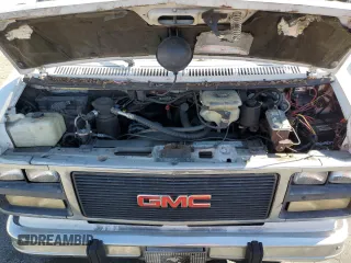 1994 GMC Vandura z VIN 1GDEG25KXRF519134, wystawiony jako Copart lot #75056124 z przebiegiem 245 597 mil mil oraz Szkody całkowita. Historia ofert i sprzedaży dostępna na DreamBid. Obrazek 13.