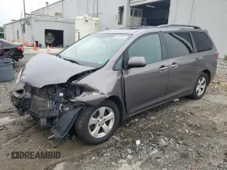 2015 Toyota Sienna XLE with VIN 5TDYK3DC7FS647939, listed as a Copart auction lot 60900055 with 249,551 mi miles and Clean title. Bid and sale history available at DreamBid. Image 1.