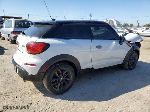 2013 MINI Cooper Paceman with VIN WMWSS1C51DWN94159, listed as a Copart auction lot 49740955 with 104,023 mi miles and Clean Title. Bid and sale history available at carsss.com. Image 3.