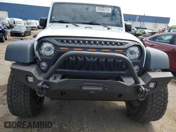 2017 Jeep Wrangler Unlimited Rubicon Recon with VIN 1C4BJWFG5HL511601, listed as a Copart auction lot 62656715 with 86,465 mi miles and Salvage title. Bid and sale history available at DreamBid. Image 5.