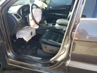 2017 Jeep Grand Cherokee Overland with VIN 1C4RJECGXHC696676, listed as a Copart auction lot 86885924 with 154,754 mi miles and Salvage Title. Bid and sale history available at carsss.com. Image 7.