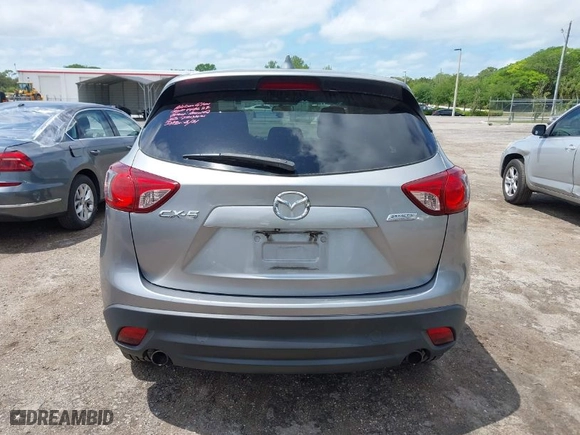 2014 Mazda CX-5 Touring with VIN JM3KE2CY4E0357445, listed as a IAAI auction lot 41967334 with 115,535 mi miles. Bid and sale history available at carsss.com. Image 17.