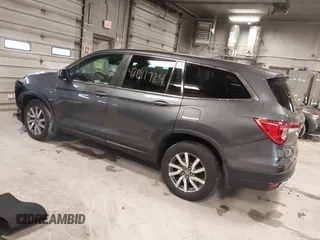 2019 Honda Pilot EX-L with VIN 5FNYF6H50KB035548, listed as a IAAI auction lot 42011724 with 105,195 mi miles and . Bid and sale history available at DreamBid. Image 3.