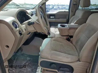 2004 Ford F-150 XLT with VIN 1FTRW12W94KC10443, listed as a Copart auction lot 63380525 with 206,815 mi miles and Salvage title. Bid and sale history available at DreamBid. Image 7.