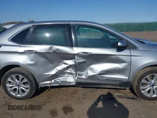 2022 Ford Edge Titanium z VIN 2FMPK4K95NBA33637, wystawiony jako IAAI lot #42074777 z przebiegiem 58 733 mil mil oraz . Historia ofert i sprzedaży dostępna na DreamBid. Obrazek 13.