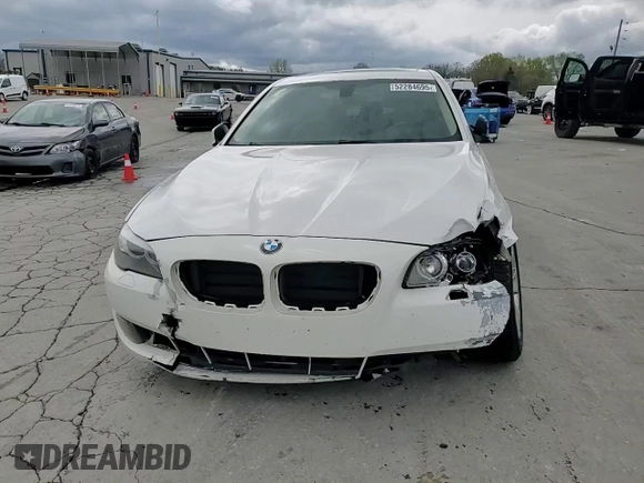 2013 BMW 5 Series 528i with VIN WBAXG5C51DDY31047, listed as a Copart auction lot 52284695 with 188,326 mi miles and Salvage Title. Bid and sale history available at DreamBid. Image 13.