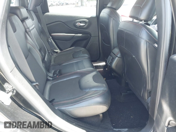 2017 Jeep Cherokee Trailhawk with VIN 1C4PJMBS9HW537962, listed as a IAAI auction lot 42002460 with 129,037 mi miles and . Bid and sale history available at DreamBid. Image 8.