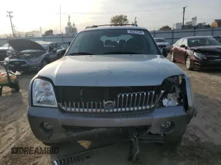 2005 Mercury Mountaineer Convenience z VIN 4M2ZU86K95UJ14463, wystawiony jako Copart lot #78227744 z przebiegiem 165 161 mil mil oraz Szkoda całkowita • Salvage title. Historia ofert i sprzedaży dostępna na DreamBid. Obrazek 5.