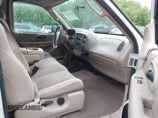 2003 Ford F-150 XL with VIN 1FTRX07WX3KD86058, listed as a IAAI auction lot 42502946 with Not provided miles and . Bid and sale history available at DreamBid. Image 5.