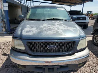 2001 Ford F-150 XLT with VIN 1FTRW08L41KB37498, listed as a Copart auction lot 62404905 with 1,513,265 mi miles and Clean title. Bid and sale history available at DreamBid. Image 5.