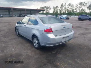 2008 Ford Focus SE with VIN 1FAHP33N58W121614, listed as a IAAI auction lot 42535574 with 156,624 mi miles and . Bid and sale history available at DreamBid. Image 3.