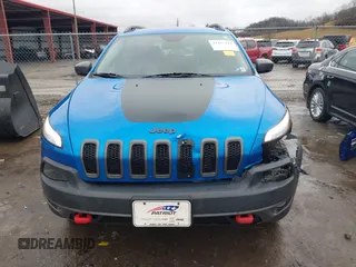 2018 Jeep Cherokee Trailhawk with VIN 1C4PJMBX3JD512813, listed as a IAAI auction lot 41457312 with 125,644 mi miles. Bid and sale history available at carsss.com. Image 13.
