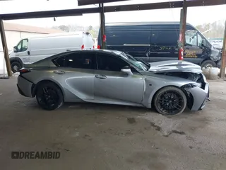 2023 Lexus IS 500 F Sport Performance z VIN JTHAP1D22P5002345, wystawiony jako IAAI lot #42068473 z przebiegiem 27 998 mil mil oraz . Historia ofert i sprzedaży dostępna na DreamBid. Obrazek 14.