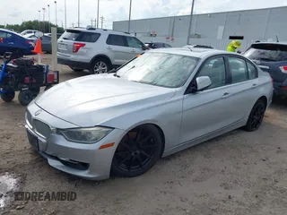 2012 BMW 3 Series 328i z VIN WBA3A5C5XCF256465, wystawiony jako IAAI lot #42225222 z przebiegiem 162 293 mil mil oraz . Historia ofert i sprzedaży dostępna na DreamBid. Obrazek 2.