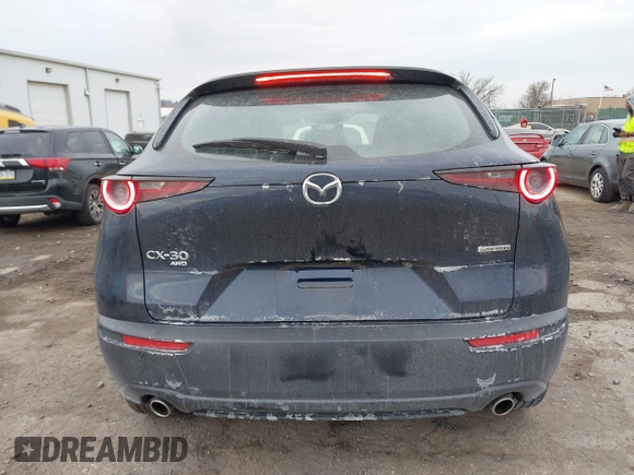 2022 Mazda CX-30 S with VIN 3MVDMBAL8NM411739, listed as a IAAI auction lot 41668265 with 34,964 mi miles and . Bid and sale history available at carsss.com. Image 15.