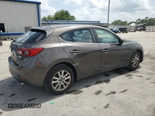 2014 Mazda 3 i Touring with VIN JM1BM1L71E1181056, listed as a Copart auction lot 59767705 with 129,447 mi miles and Salvage title. Bid and sale history available at DreamBid. Image 3.