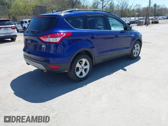 2016 Ford Escape SE with VIN 1FMCU9GX1GUB28870, listed as a IAAI auction lot 42129628 with 113,909 mi miles. Bid and sale history available at carsss.com. Image 4.