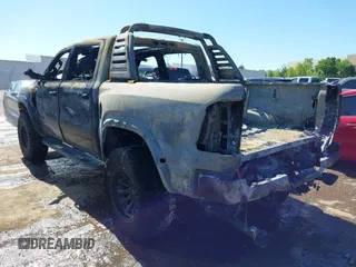 2022 Ram 1500 TRX with VIN 1C6SRFU99NN151639, listed as a IAAI auction lot 42145733 with Not provided miles and . Bid and sale history available at DreamBid. Image 3.
