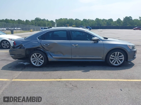 2017 Volkswagen Passat SE with VIN 1VWGT7A33HC058764, listed as a IAAI auction lot 42668036 with 76,732 mi miles and . Bid and sale history available at DreamBid. Image 13.