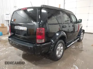 2007 Dodge Nitro SLT with VIN 1D8GT58K77W724530, listed as a IAAI auction lot 41499022 with 214,183 mi miles. Bid and sale history available at carsss.com. Image 4.