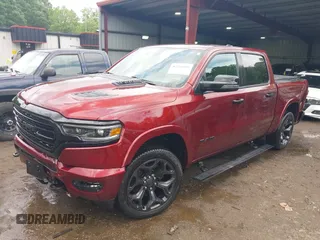 2023 Ram 1500 Limited with VIN 1C6SRFHM2PN509939, listed as a IAAI auction lot 42514018 with 31,669 mi miles and . Bid and sale history available at DreamBid. Image 2.